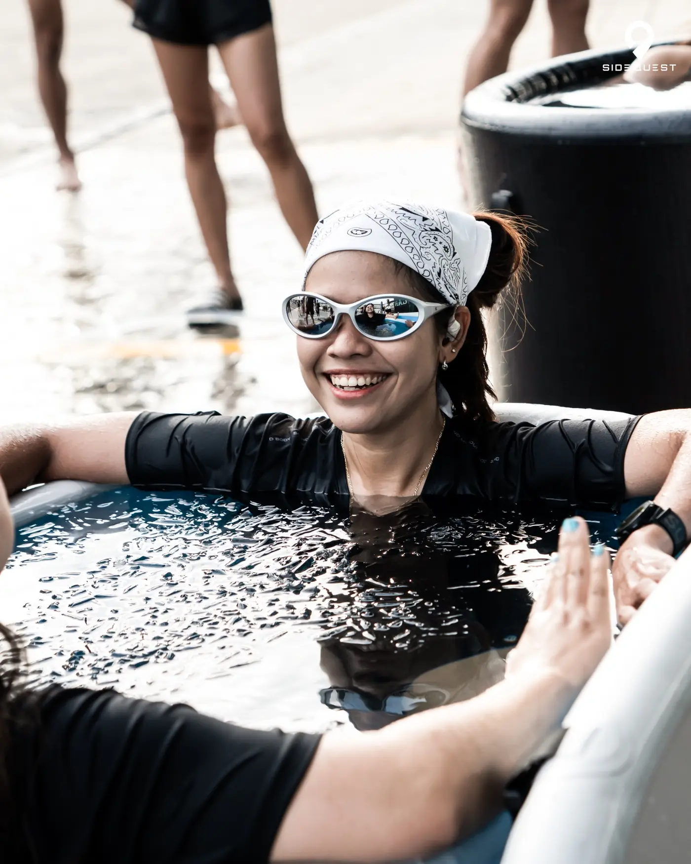 Side Quest participant enjoying an ice bath recovery session