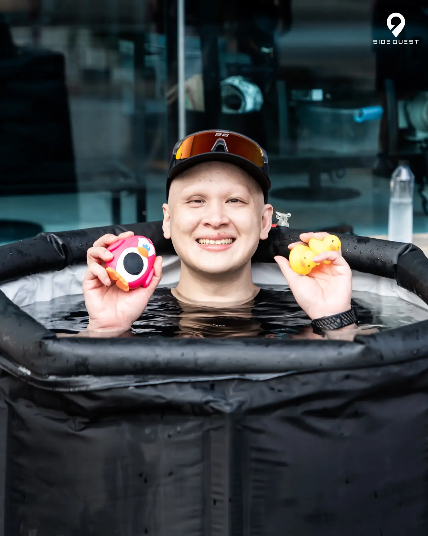 A participant enjoying a playful ice bath moment