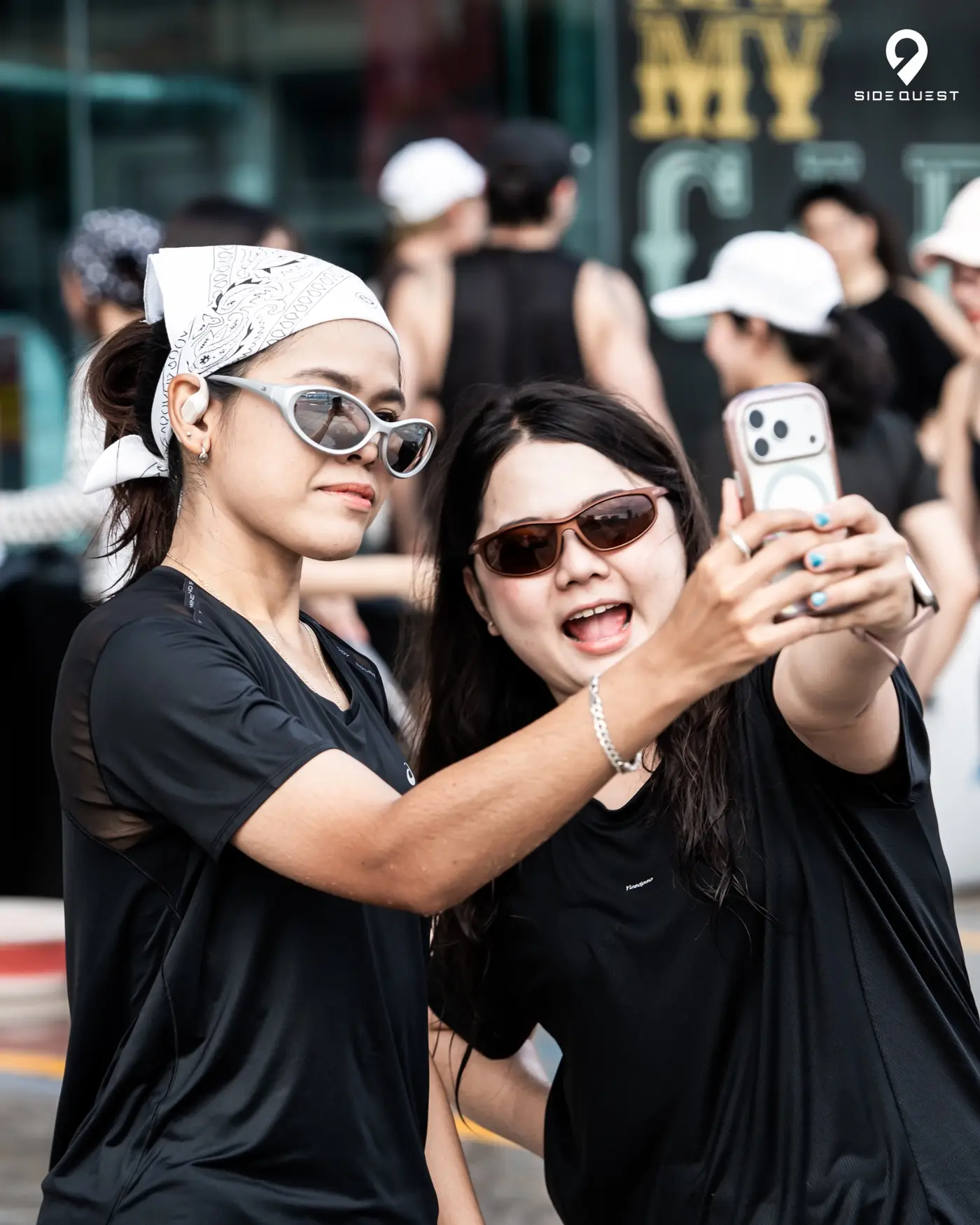 Friends taking a selfie at Side Quest Event 004